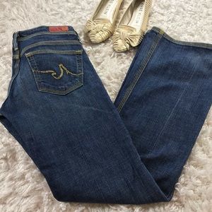 AG- THE MERLOT LOW RISE BOOT CUT JEANS